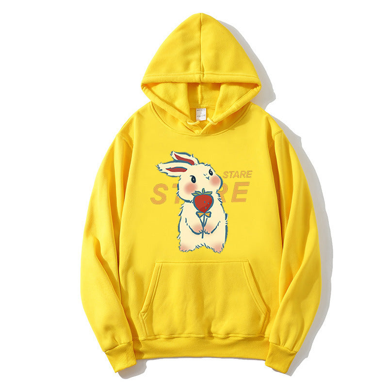 Kvinnohoodie med lekfullt kaninmotiv och inspirerande slogan Mirla-Eva Jonsson