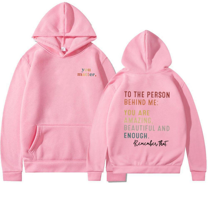 Kvinnohoodie med motiverande text Mirla-Eva Jonsson