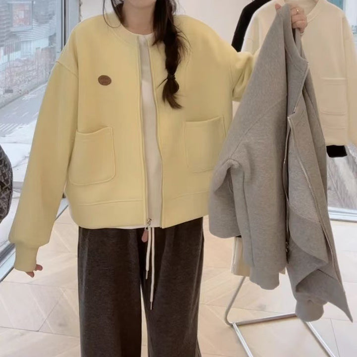 Kvinnooversized sweatjacka med praktiska fickor och modernt design Mirla-Eva Jonsson