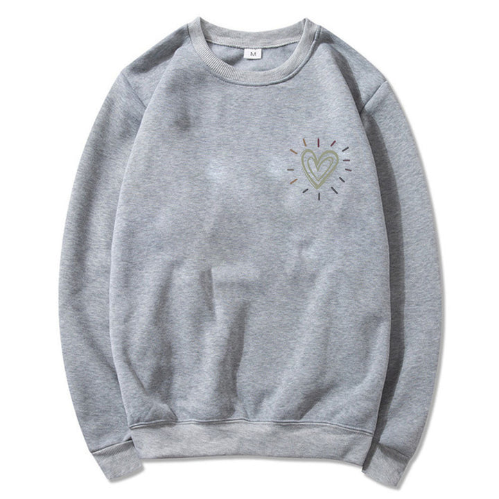 Kvinnooversized sweatshirt med sött hjärtmotiv och avslappnad skärning Mirla-Eva Jonsson