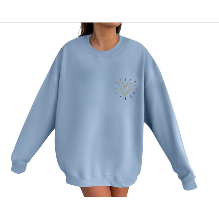 Kvinnooversized sweatshirt med sött hjärtmotiv och avslappnad skärning Mirla-Eva Jonsson