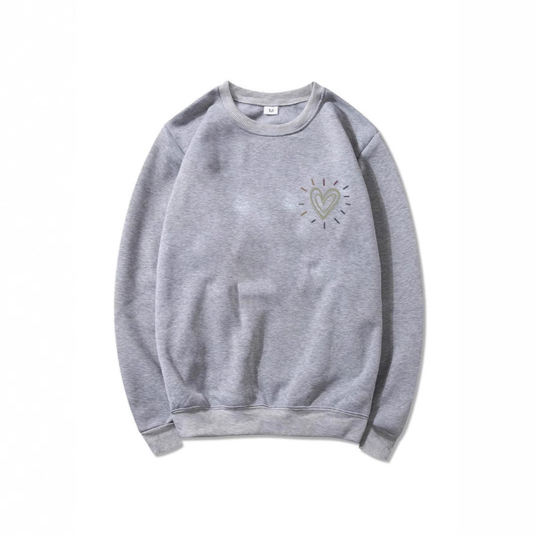 Kvinnooversized sweatshirt med sött hjärtmotiv och avslappnad skärning Mirla-Eva Jonsson