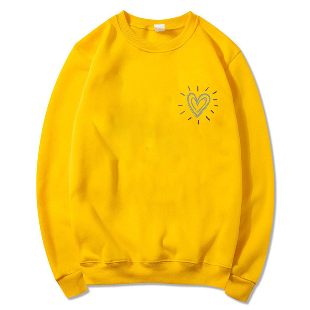 Kvinnooversized sweatshirt med sött hjärtmotiv och avslappnad skärning Mirla-Eva Jonsson
