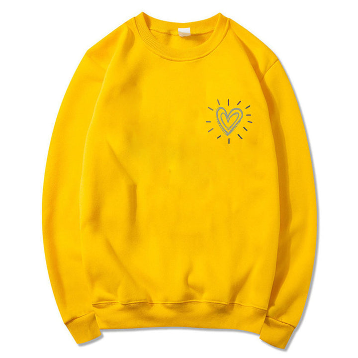 Kvinnooversized sweatshirt med sött hjärtmotiv och avslappnad skärning Mirla-Eva Jonsson