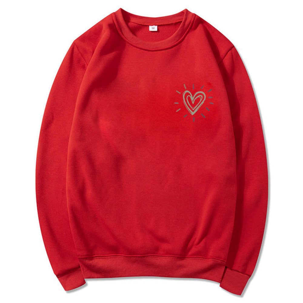 Kvinnooversized sweatshirt med sött hjärtmotiv och avslappnad skärning Mirla-Eva Jonsson
