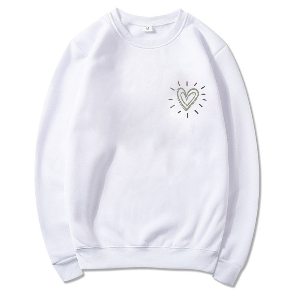 Kvinnooversized sweatshirt med sött hjärtmotiv och avslappnad skärning Mirla-Eva Jonsson