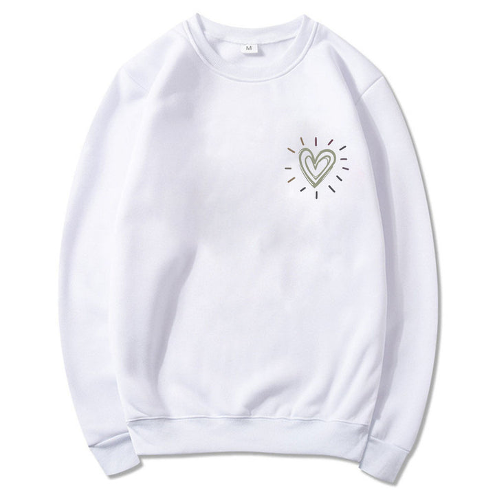 Kvinnooversized sweatshirt med sött hjärtmotiv och avslappnad skärning Mirla-Eva Jonsson