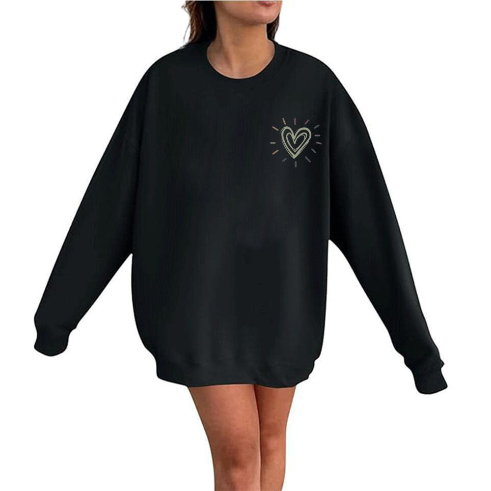Kvinnooversized sweatshirt med sött hjärtmotiv och avslappnad skärning Mirla-Eva Jonsson