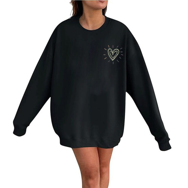Kvinnooversized sweatshirt med sött hjärtmotiv och avslappnad skärning Mirla-Eva Jonsson