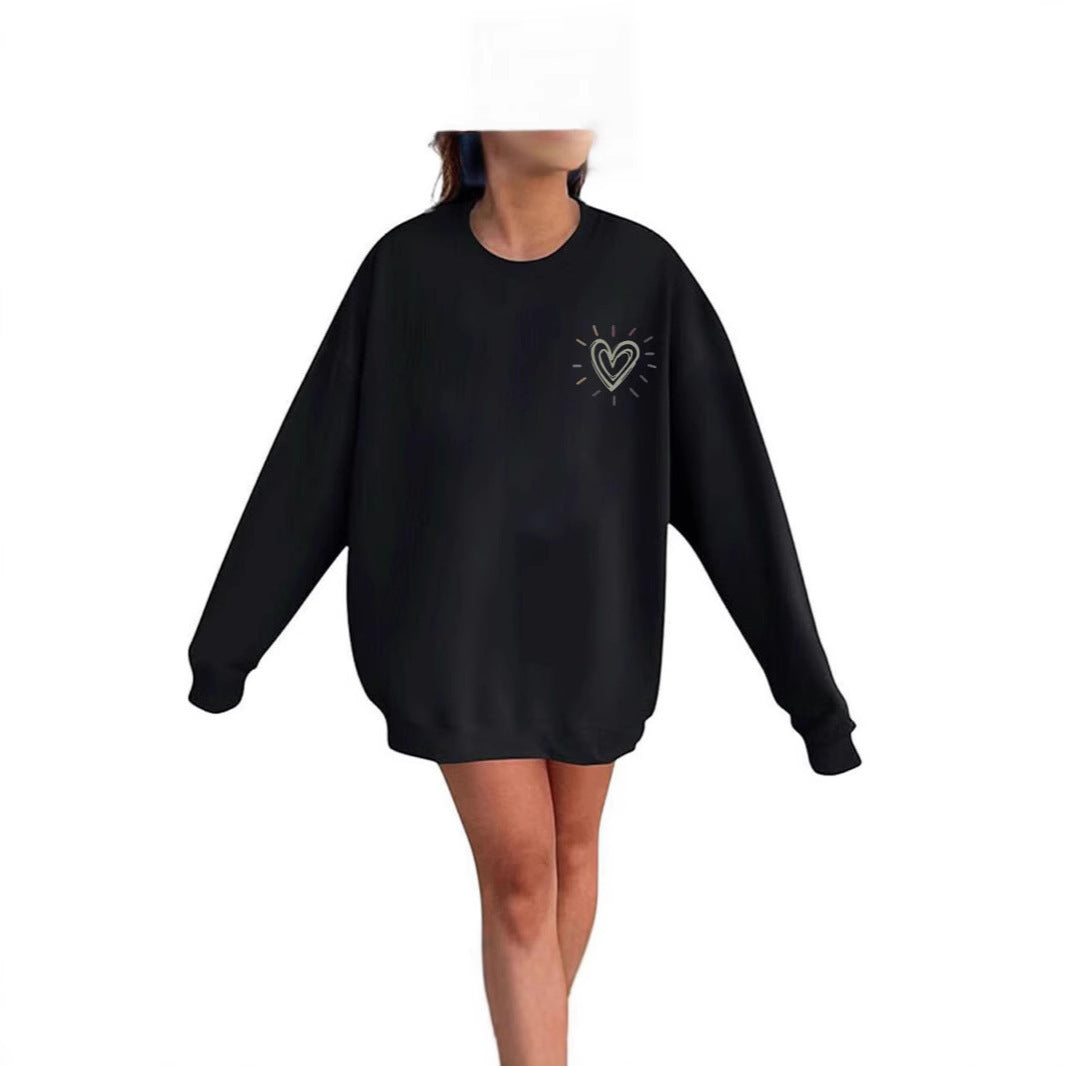 Kvinnooversized sweatshirt med sött hjärtmotiv och avslappnad skärning Mirla-Eva Jonsson