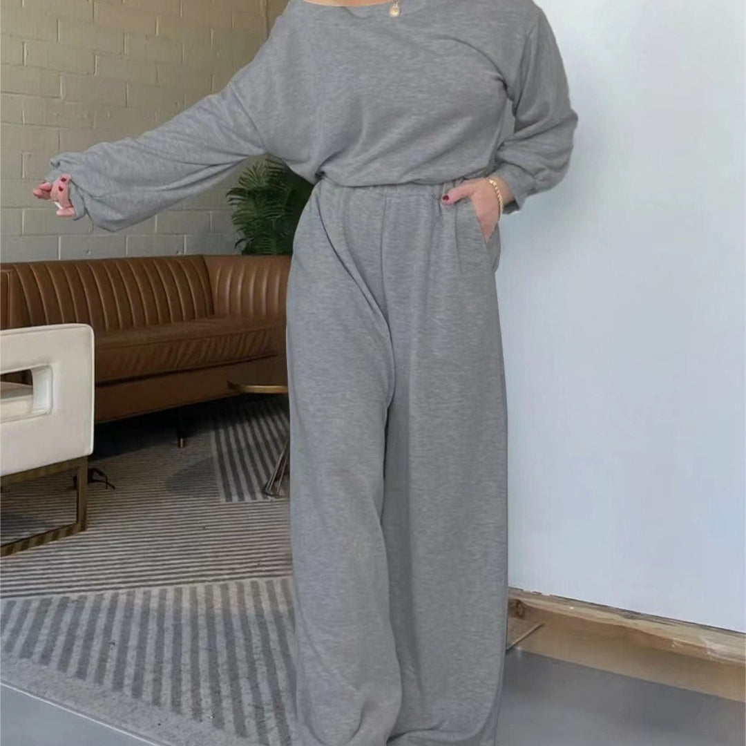 Kvinnor Bekväm Jumpsuit med Bred Skärning Ben och Djup Urringning Mirla-Eva Jonsson