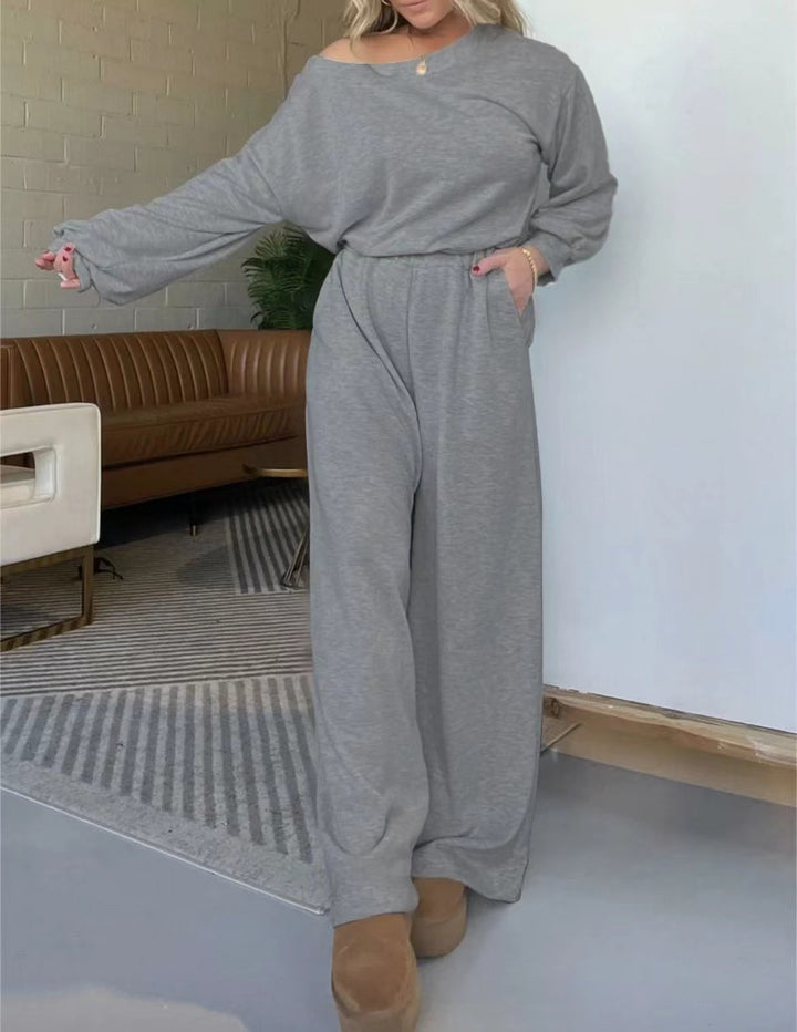 Kvinnor Bekväm Jumpsuit med Bred Skärning Ben och Djup Urringning Mirla-Eva Jonsson