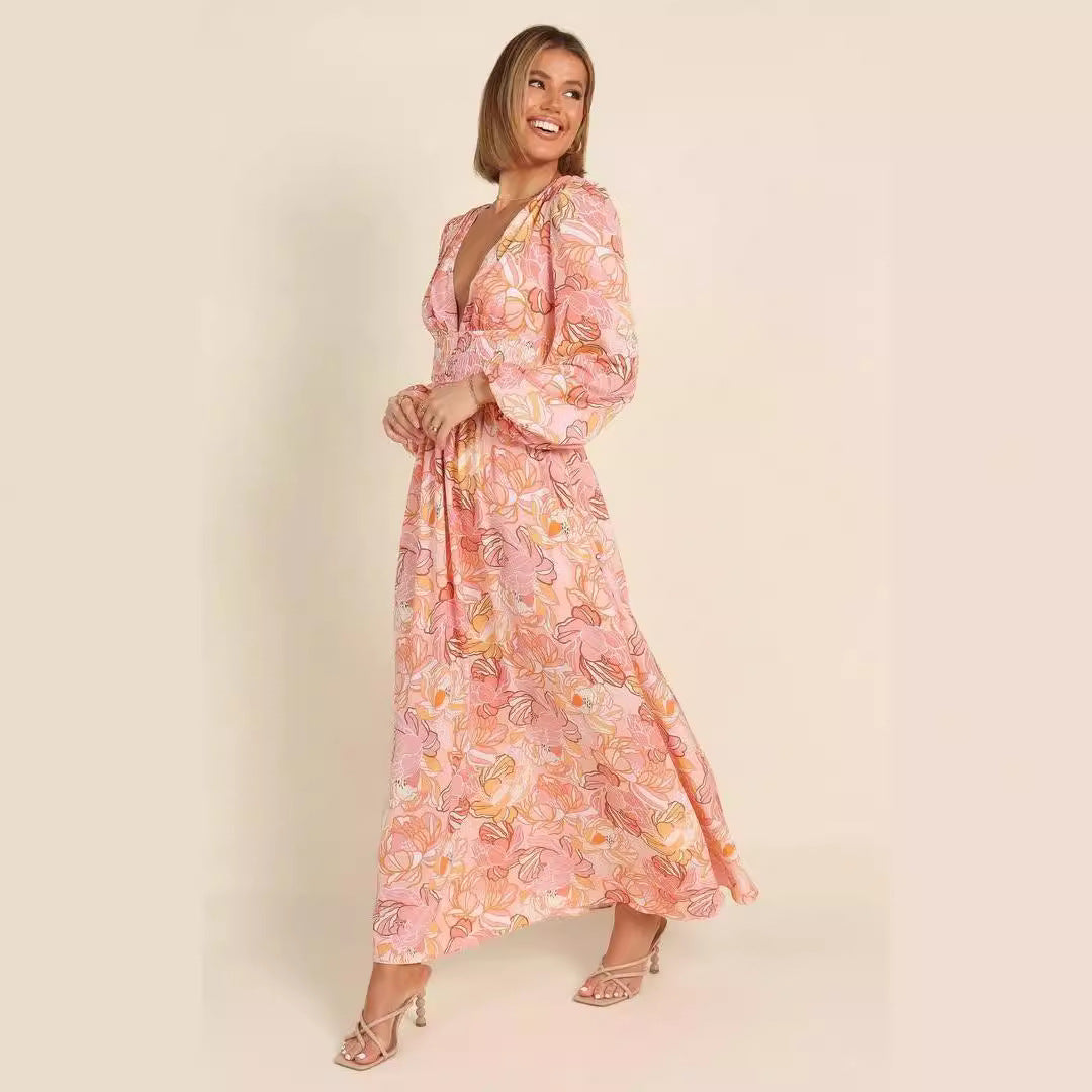 Kvinnor Blommönster Sommardress med djup V-hals och puffärmar Mirla-Eva Jonsson