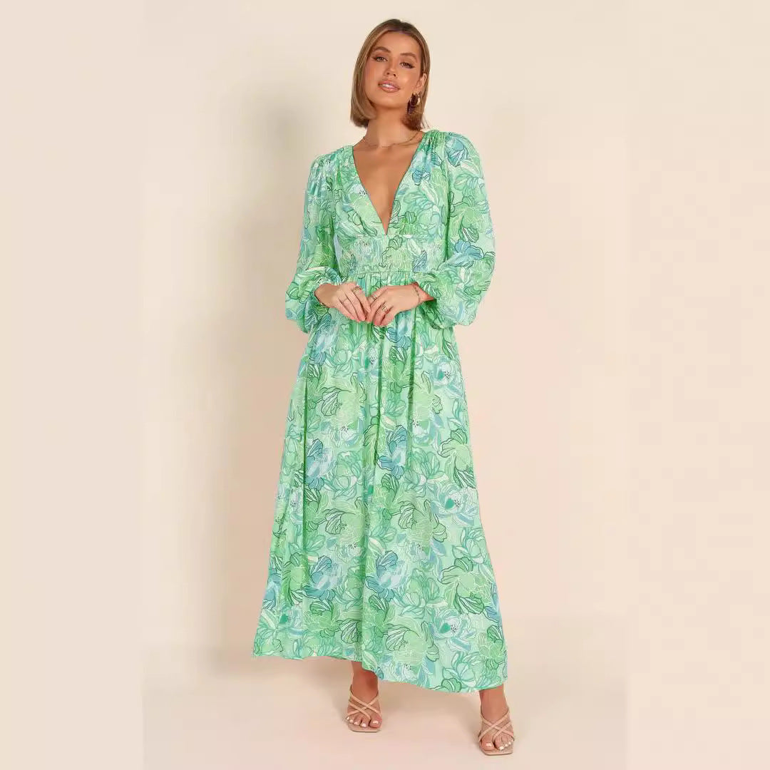 Kvinnor Blommönster Sommardress med djup V-hals och puffärmar Mirla-Eva Jonsson