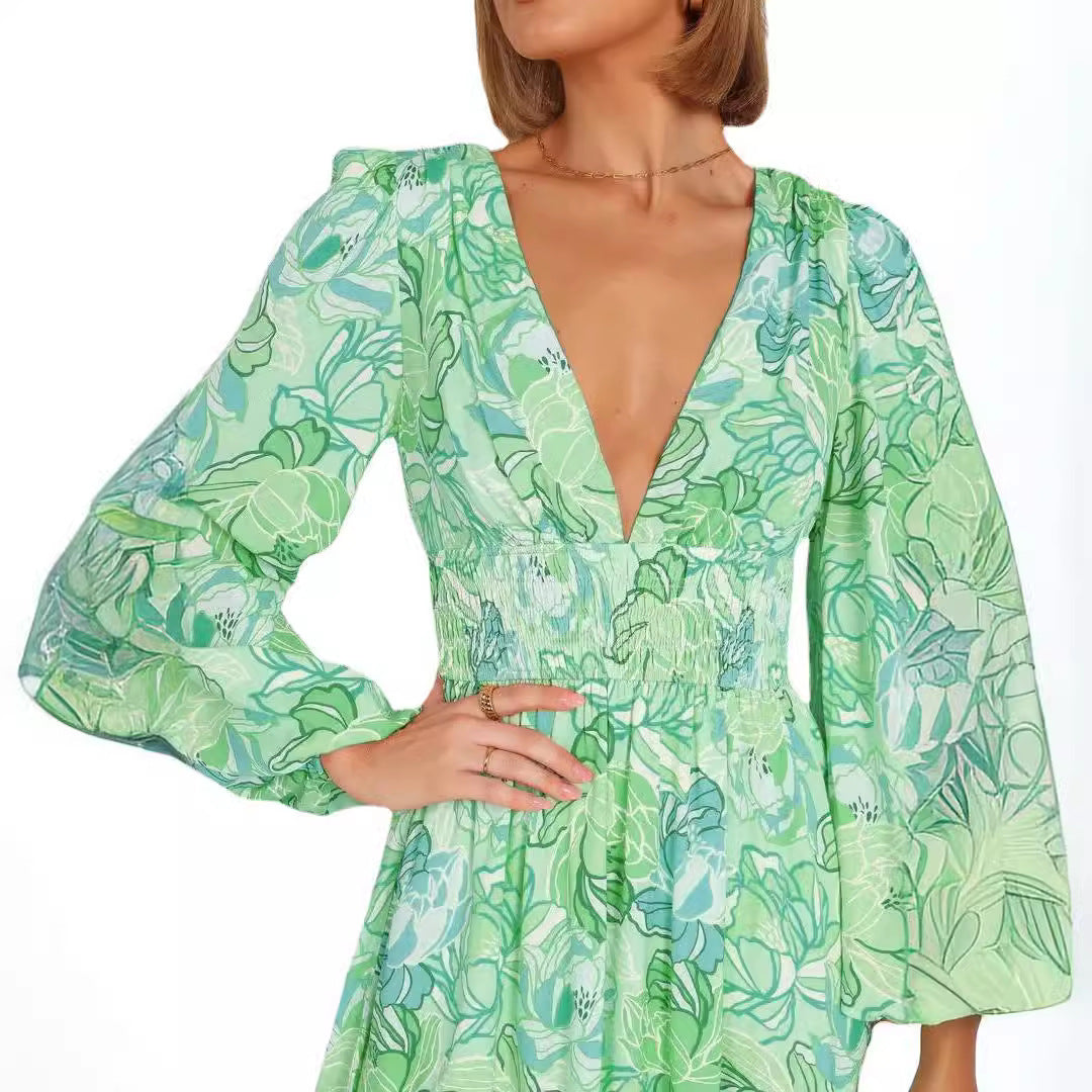 Kvinnor Blommönster Sommardress med djup V-hals och puffärmar Mirla-Eva Jonsson