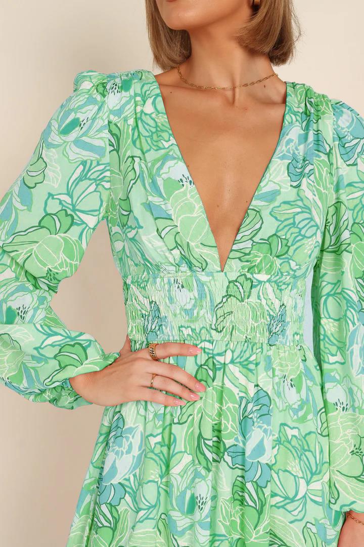 Kvinnor Blommönster Sommardress med djup V-hals och puffärmar Mirla-Eva Jonsson
