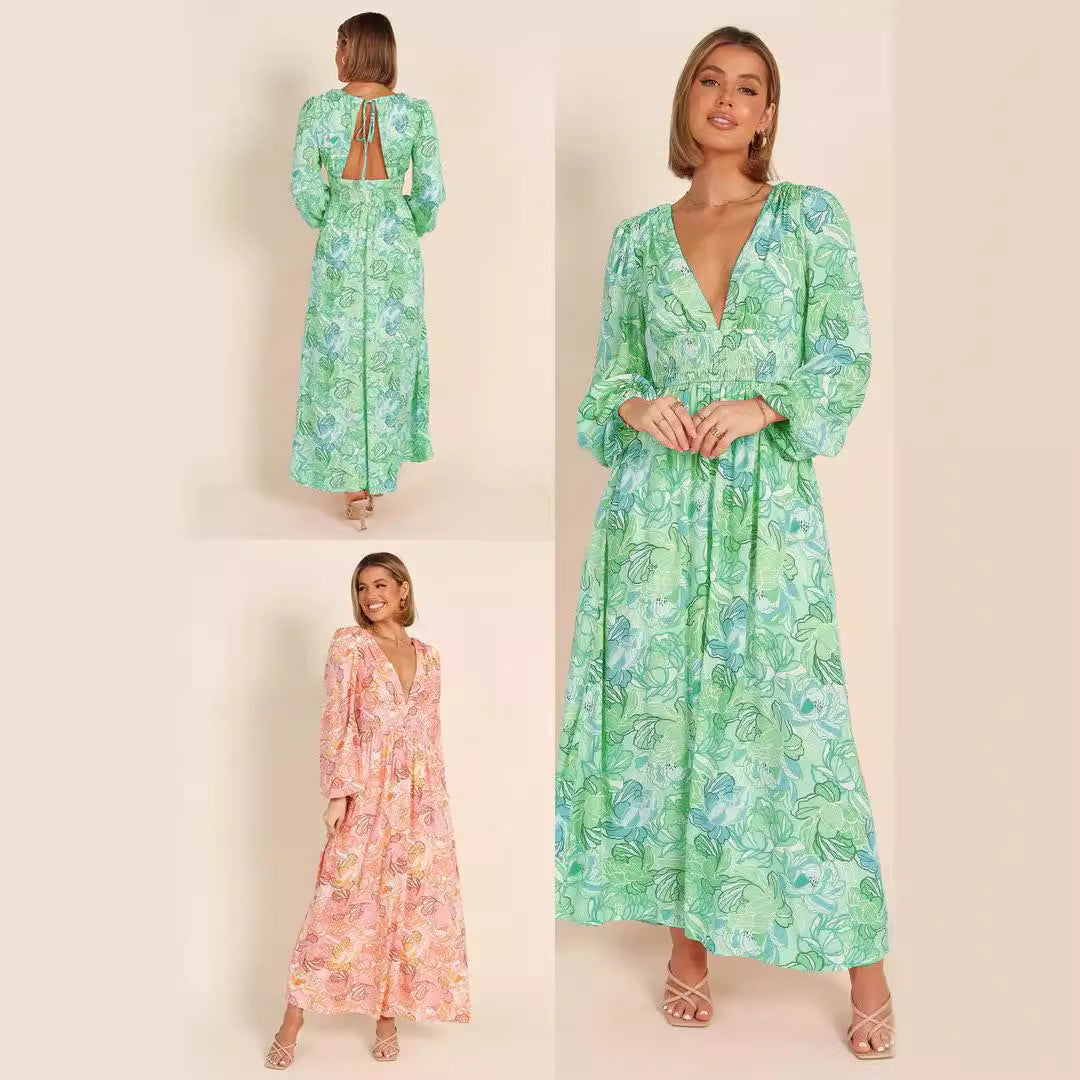 Kvinnor Blommönster Sommardress med djup V-hals och puffärmar Mirla-Eva Jonsson