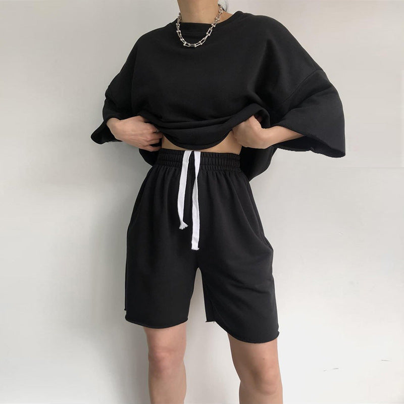 Kvinnor Casual Oversized Fritidsset med Kortärmad Topp och Lösa Shortsen Mirla-Eva Jonsson