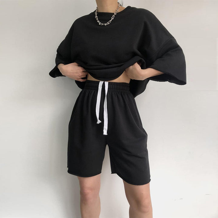 Kvinnor Casual Oversized Fritidsset med Kortärmad Topp och Lösa Shortsen Mirla-Eva Jonsson