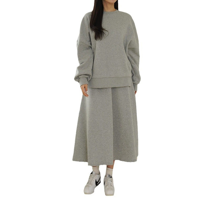 Kvinnor Casual Sweatshirt och Maxi Kjol Set med Praktiska Fickor och Elegant Skärning Mirla-Eva Jonsson