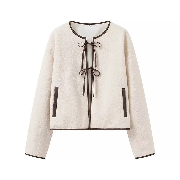 Kvinnor Cozy Fleece Jacka med Båge Accent och Praktiska Fickor Mirla-Eva Jonsson