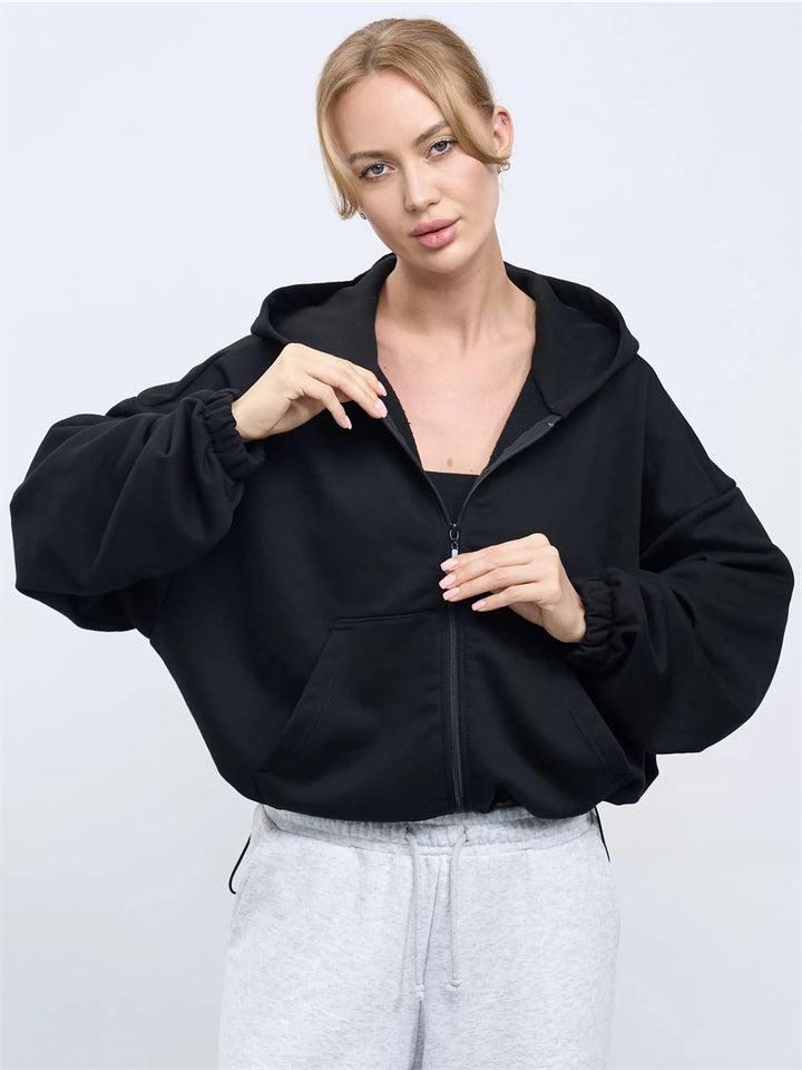 Kvinnor Cropped Hoodie Jacka med Dragkedja och Oversized Ärmar Mirla-Eva Jonsson