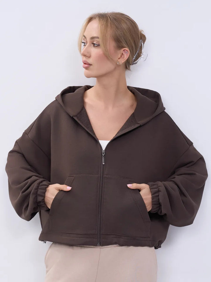 Kvinnor Cropped Hoodie Jacka med Dragkedja och Oversized Ärmar Mirla-Eva Jonsson