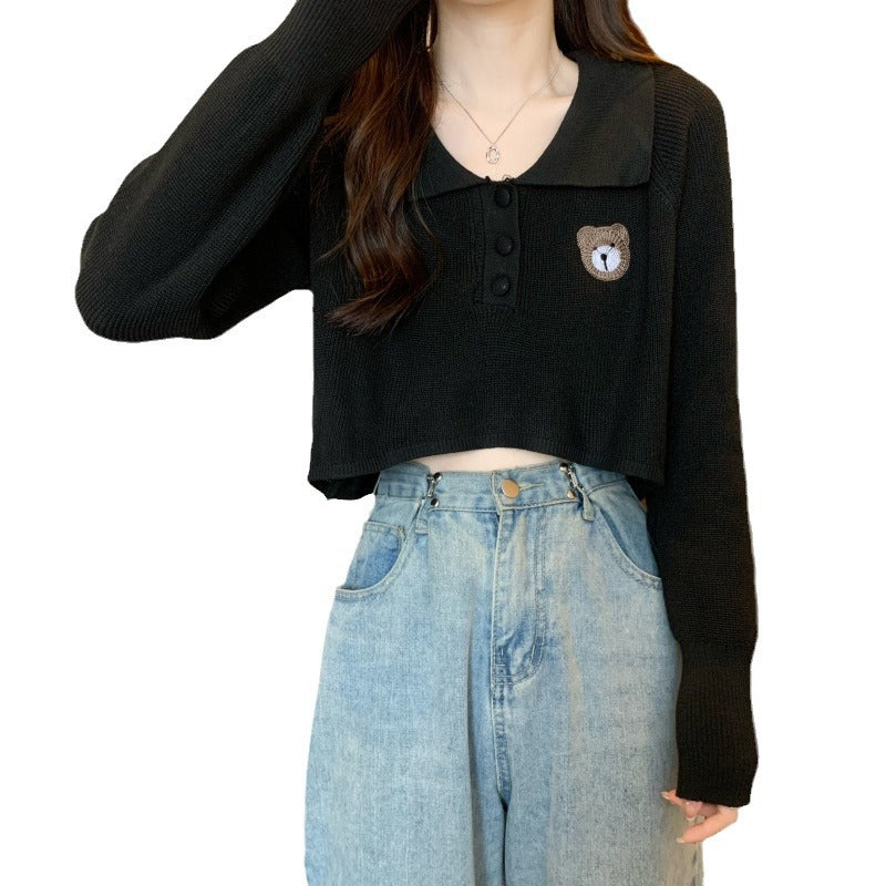 Kvinnor Cropped Pullover med en knappstängning och enhörningsemblem-Eva Jonsson