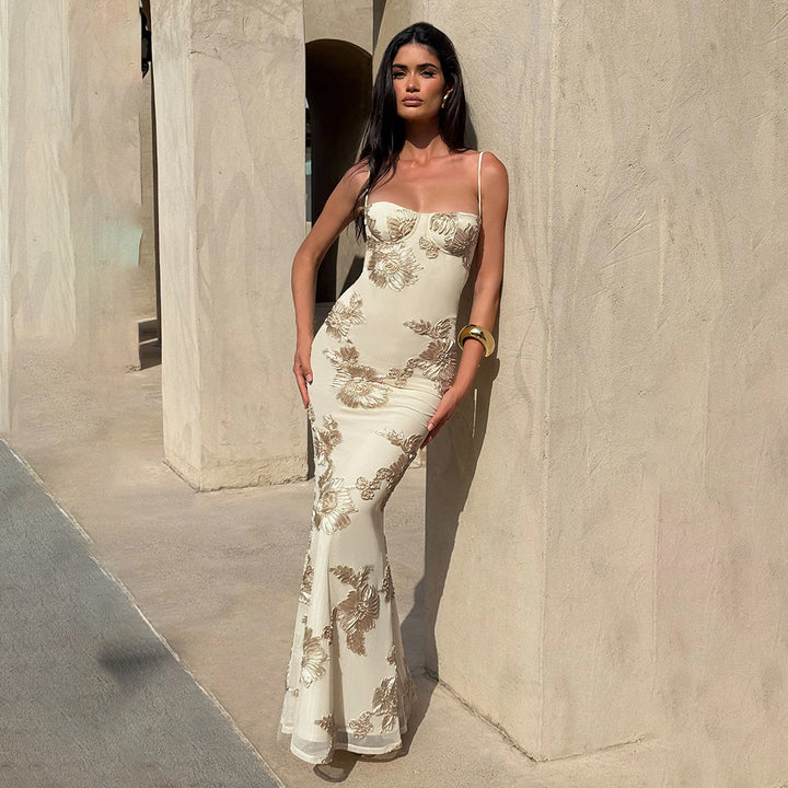 Kvinnor Elegant Golvkonturerande Maxiklänning med Spaghettiband och Blommönster Mirla-Eva Jonsson