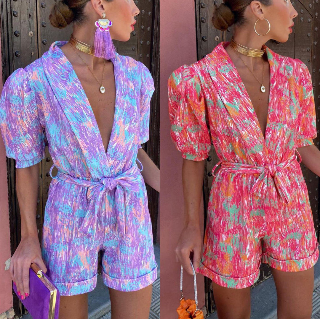 Kvinnor Elegant Jumpsuit med Djup V-Hals och Knäppt Bälte Mirla-Eva Jonsson