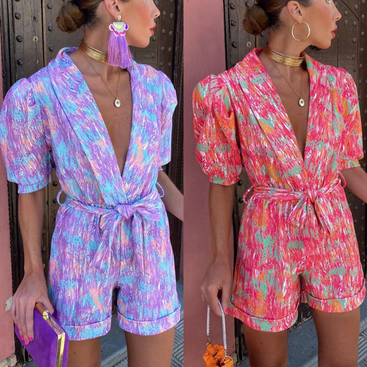Kvinnor Elegant Jumpsuit med Djup V-Hals och Knäppt Bälte Mirla-Eva Jonsson