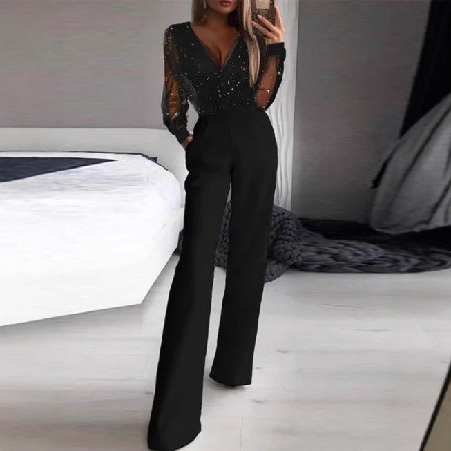 Kvinnor Elegant Jumpsuit med Transparent Blus och Glittrande Accenter-Eva Jonsson