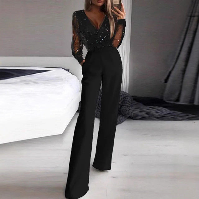 Kvinnor Elegant Jumpsuit med Transparent Blus och Glittrande Accenter-Eva Jonsson