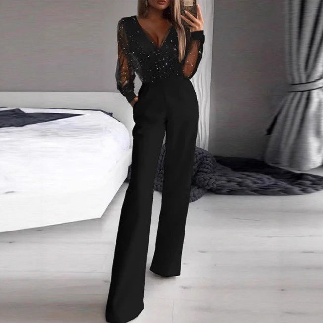 Kvinnor Elegant Jumpsuit med Transparent Blus och Glittrande Accenter-Eva Jonsson