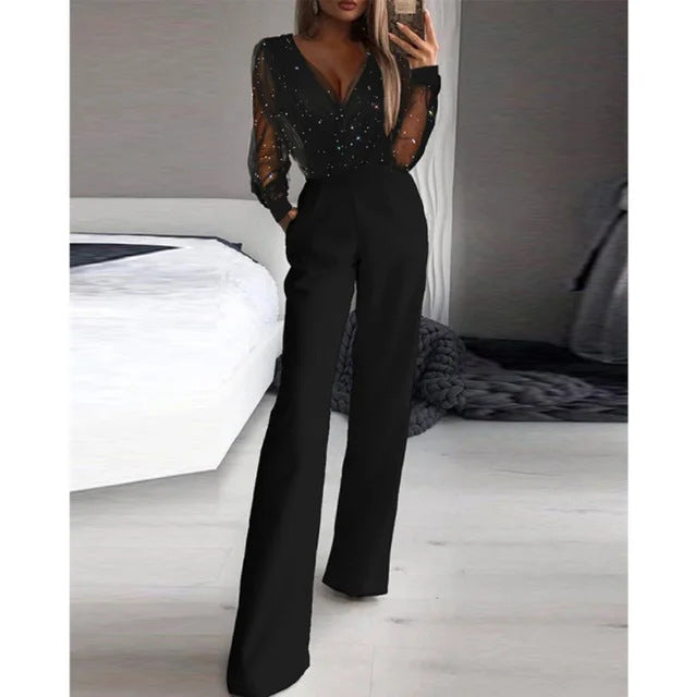 Kvinnor Elegant Jumpsuit med Transparent Blus och Glittrande Accenter-Eva Jonsson