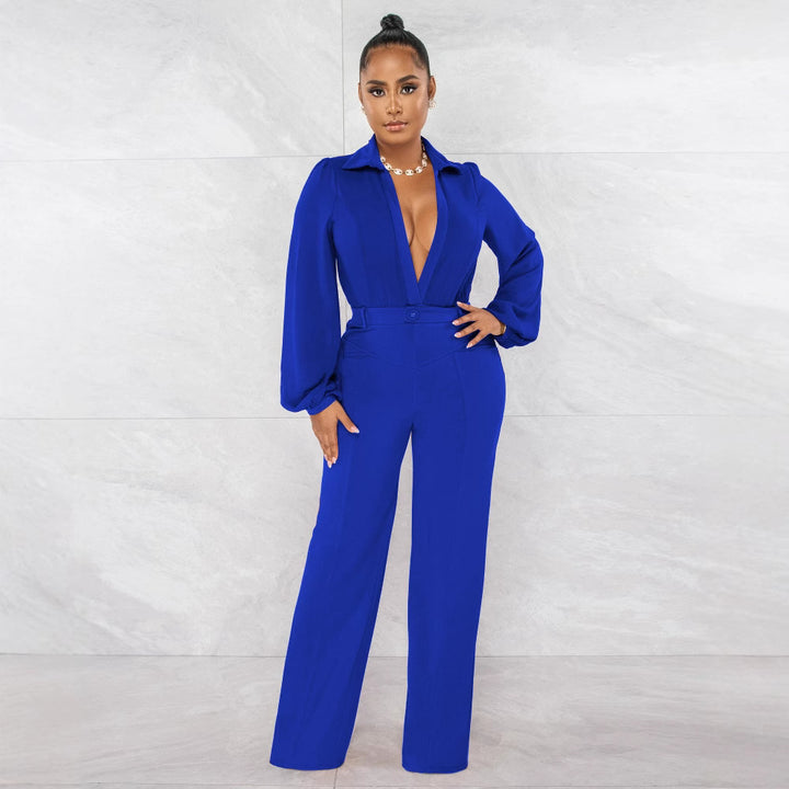 Kvinnor Elegant Jumpsuit med djup V-ringning och vid ben Mirla-Eva Jonsson