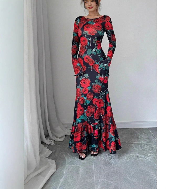 Kvinnor Elegant Maxi Klänning med Blommigt Volang Detaljer och Lång Ärmen Mirla-Eva Jonsson