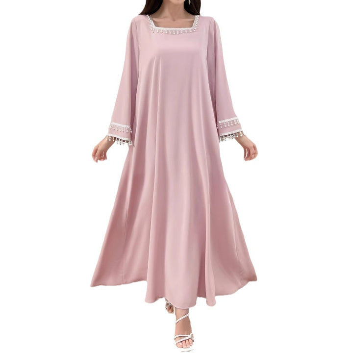Kvinnor Elegant Maxi Klänning med Dekorativa Fransar och Breda Ärmar-Eva Jonsson
