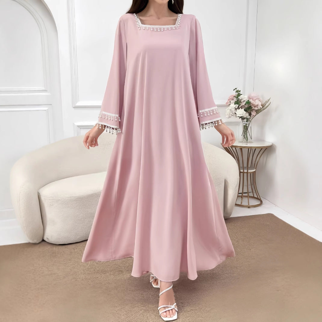 Kvinnor Elegant Maxi Klänning med Dekorativa Fransar och Breda Ärmar-Eva Jonsson