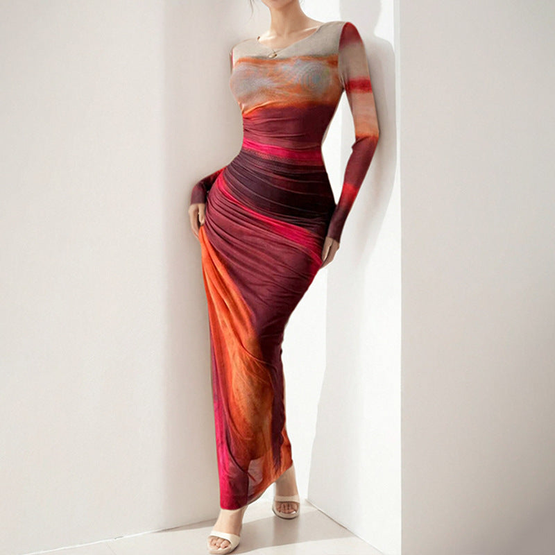 Kvinnor Elegant Maxi Klänning med Fina Draperingseffekter och Lång Ärmar Mirla-Eva Jonsson