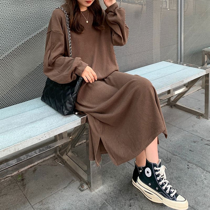 Kvinnor Elegant Maxi Klänning med Långa Ärmar och Texturerad Design-Eva Jonsson