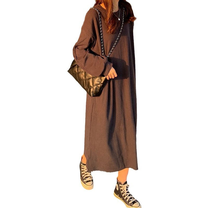 Kvinnor Elegant Maxi Klänning med Långa Ärmar och Texturerad Design-Eva Jonsson