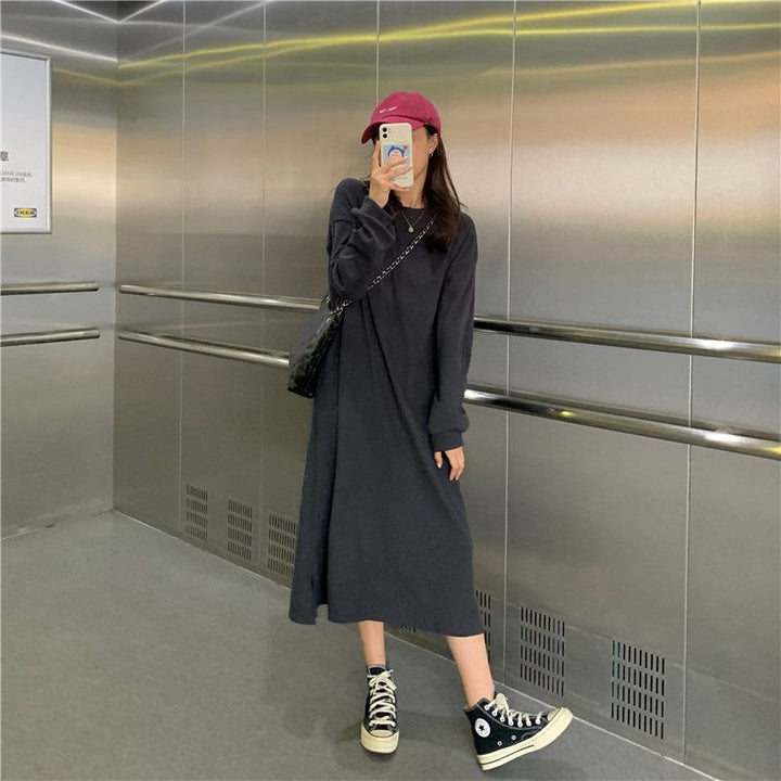 Kvinnor Elegant Maxi Klänning med Långa Ärmar och Texturerad Design-Eva Jonsson