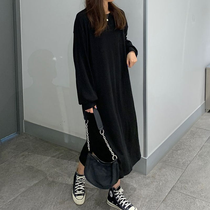 Kvinnor Elegant Maxi Klänning med Långa Ärmar och Texturerad Design-Eva Jonsson