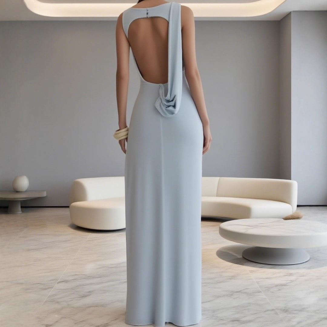 Kvinnor Elegant Maxi-klänning med sofistikerad drapering och asymmetrisk skärning Mirla-Eva Jonsson
