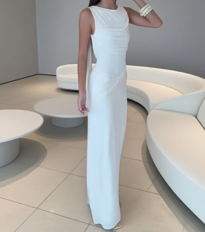 Kvinnor Elegant Maxi-klänning med sofistikerad drapering och asymmetrisk skärning Mirla-Eva Jonsson