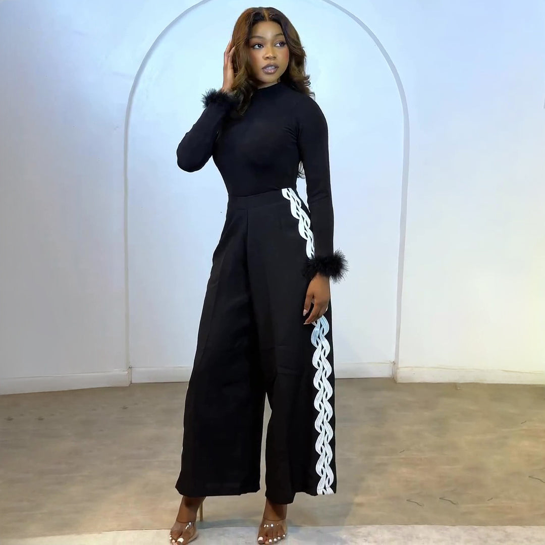 Kvinnor Elegant Set med figurnära topp och vid byxstil Mirla-Eva Jonsson