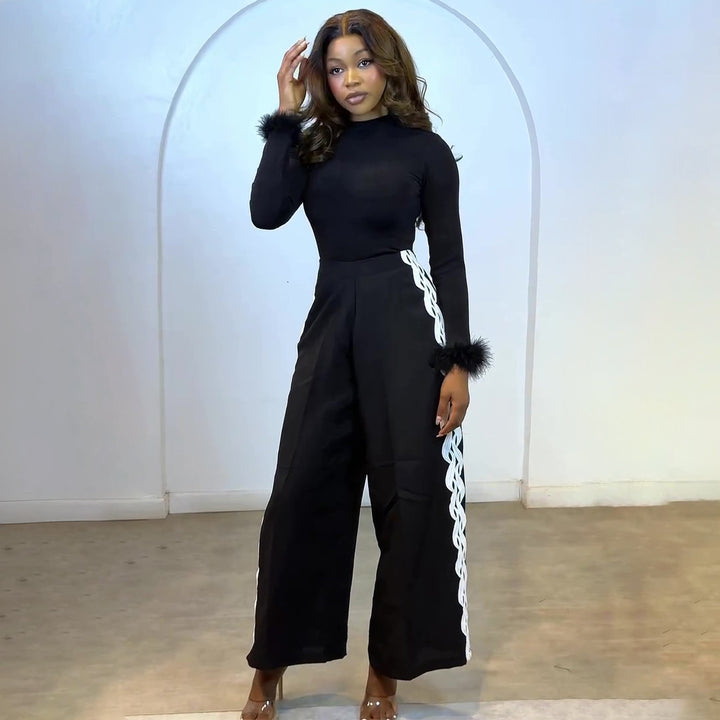 Kvinnor Elegant Set med figurnära topp och vid byxstil Mirla-Eva Jonsson