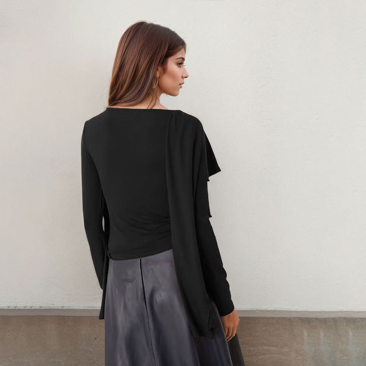Kvinnor Elegant Topp med Asymmetrisk Design och Bredskurna Ärmar Mirla-Eva Jonsson