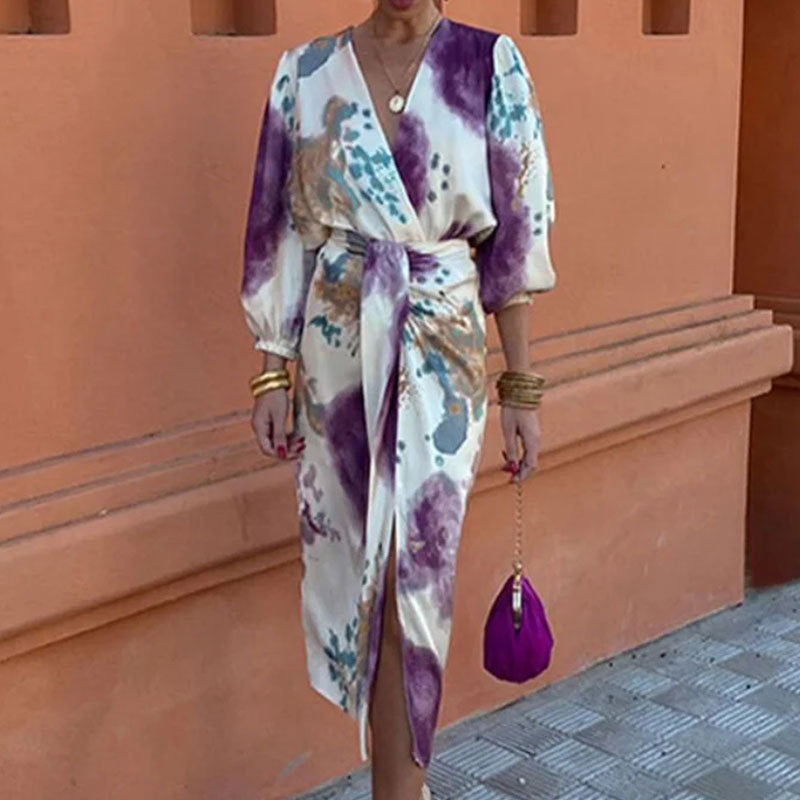 Kvinnor Elegant Utdraget Omslag Klänning med Blommönster och Vida Ärmar Mirla-Eva Jonsson